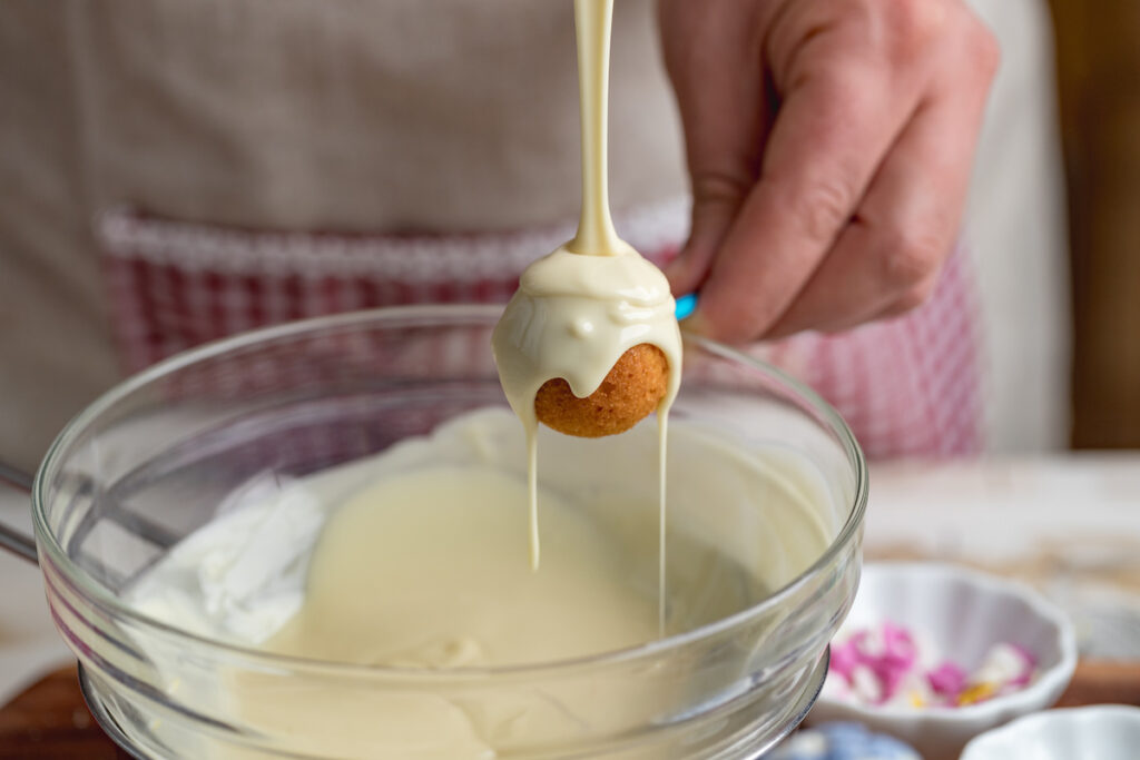 Dipping Cake Pop into Candy Melts